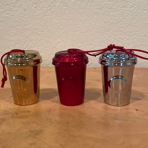 Lot of three metallic-glazed porcelain Starbucks cup ornaments or miniatures